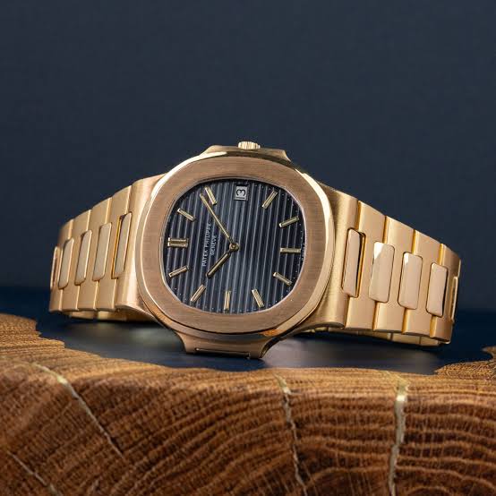 PP - UNWORN NAUTILUS TRAVEL TIME CHRONOGRAPH BLUE & Brown
