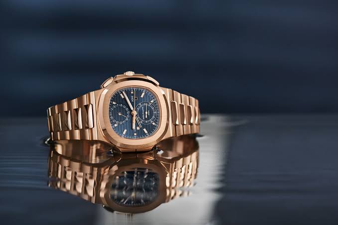 PP - UNWORN NAUTILUS TRAVEL TIME CHRONOGRAPH BLUE & Brown