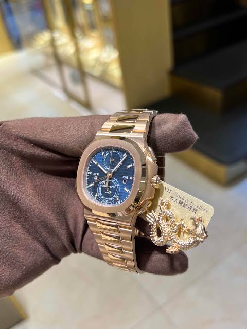 PP - UNWORN NAUTILUS TRAVEL TIME CHRONOGRAPH BLUE & Brown